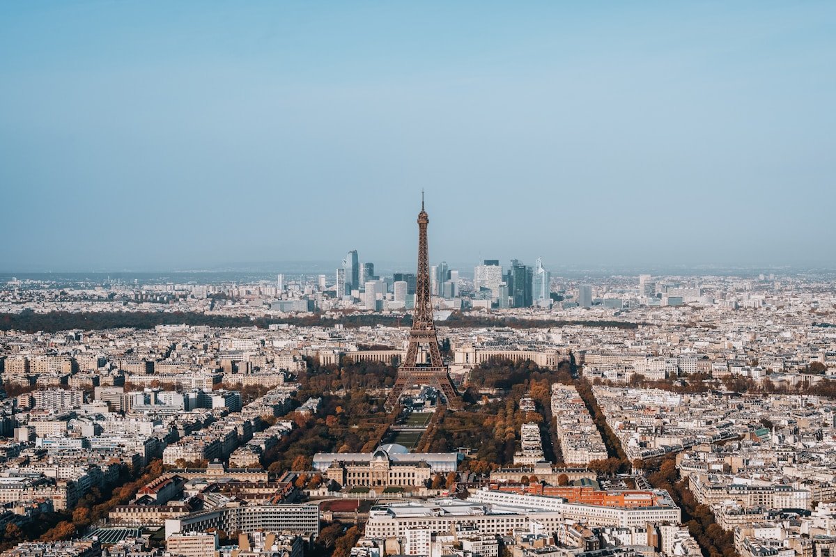 The Eiffel Tower above rooftops in Paris, France